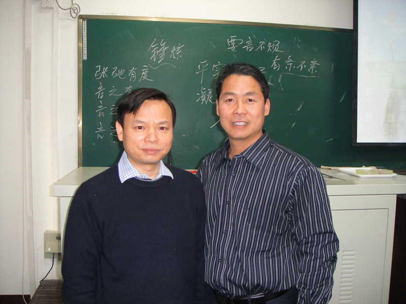 集团谭总裁与北师大肖川教授（左）.JPG